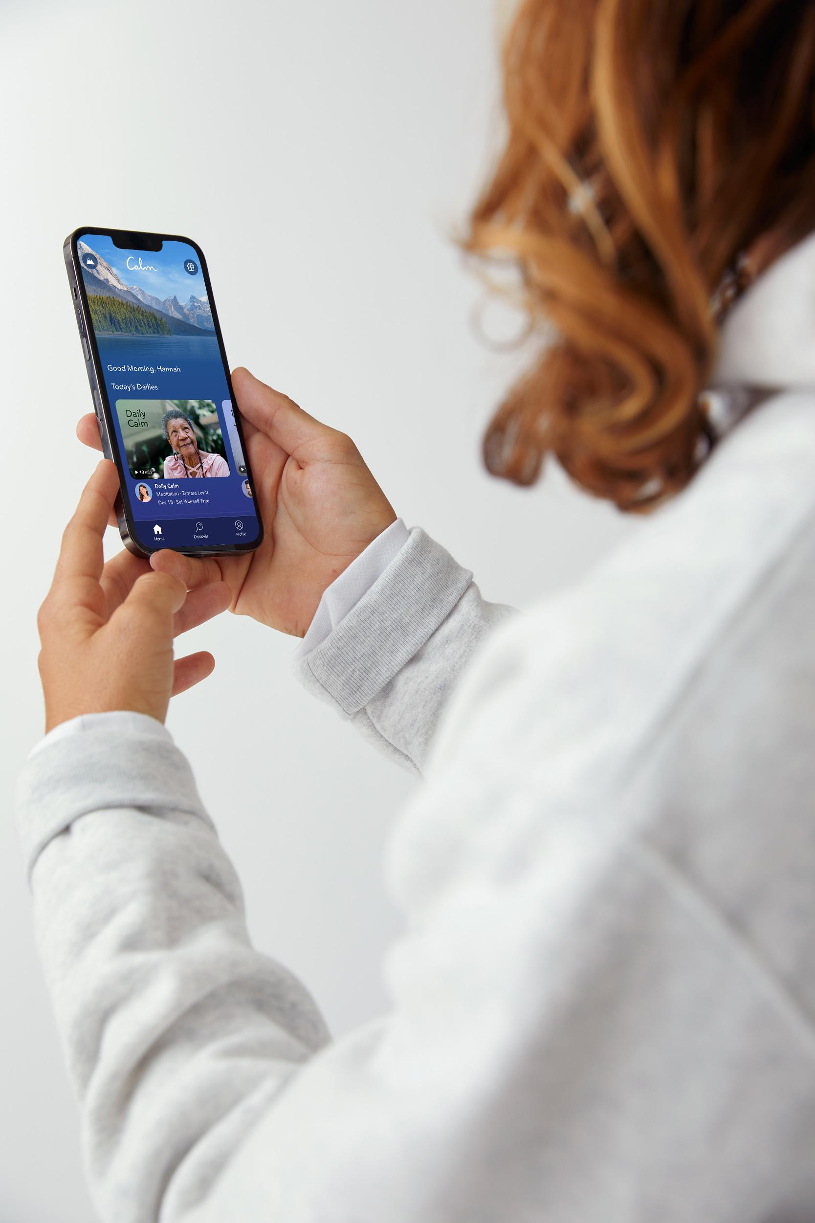 Person holding a phone with the Calm app open