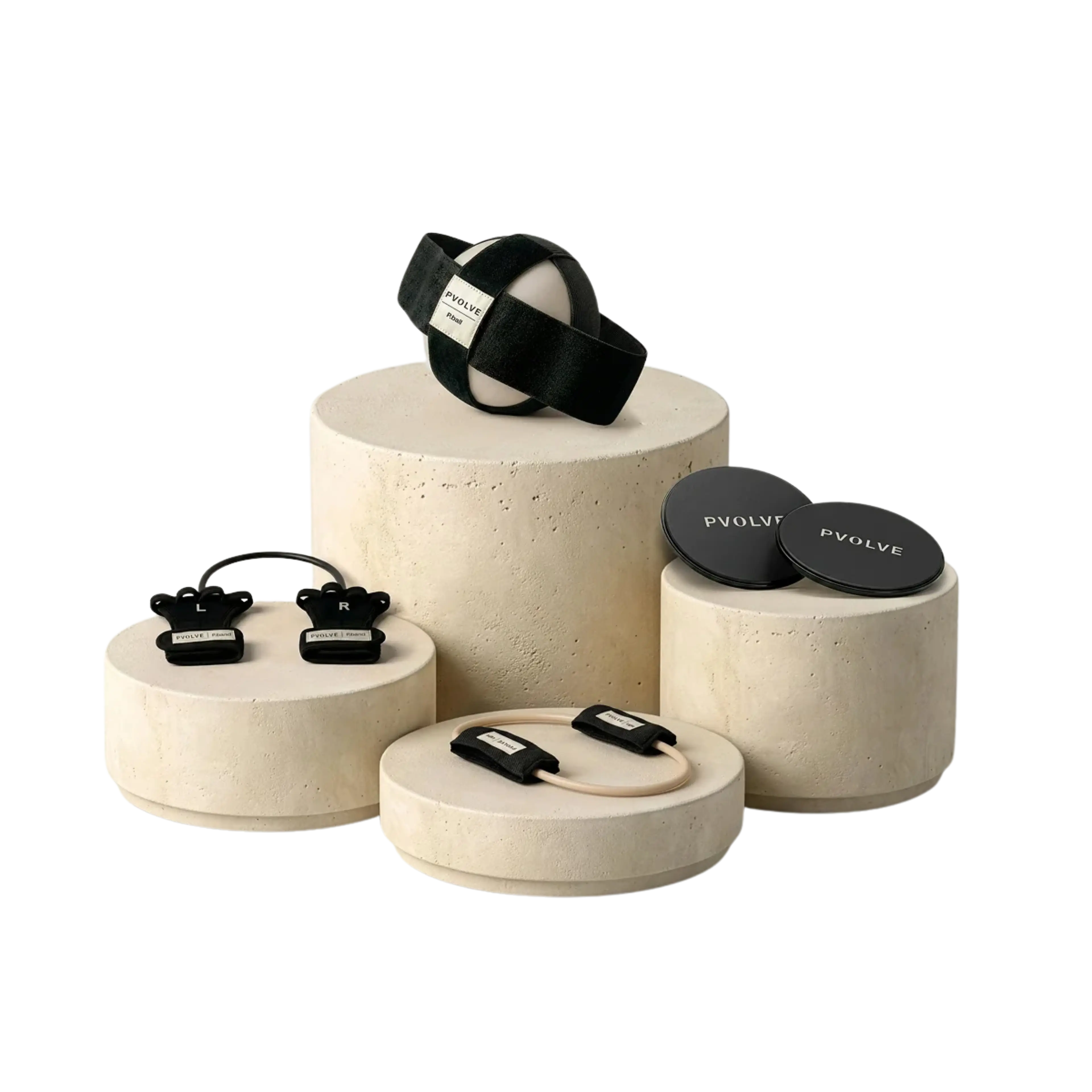 P.VOLVE fitness equipment: a weighted ball with strap, ankle weights, gliders, and a resistance band.