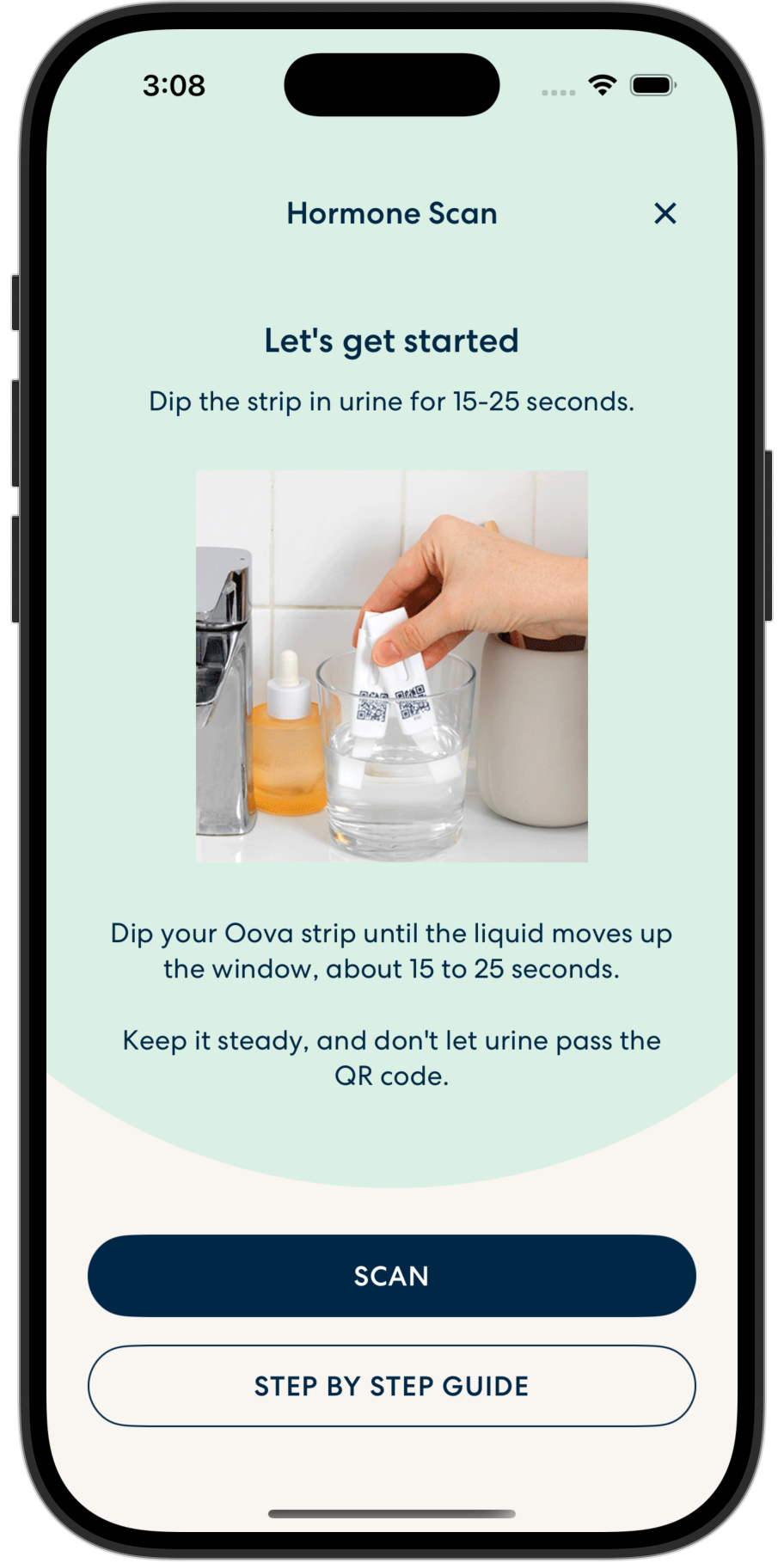 A smartphone displaying an app for a hormone scan, showing instructions and an image of a hand dipping a test strip into a glass.