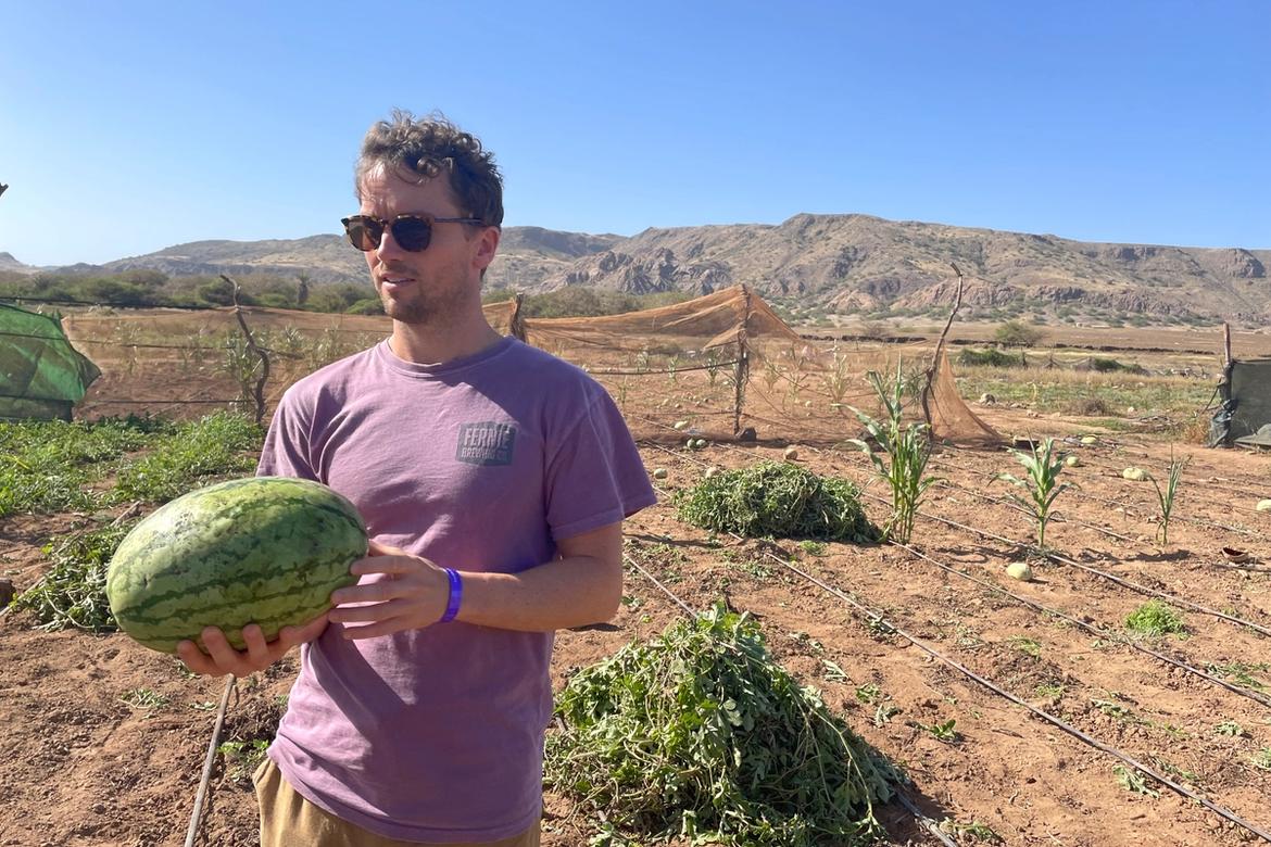 Paul holding a watermelon