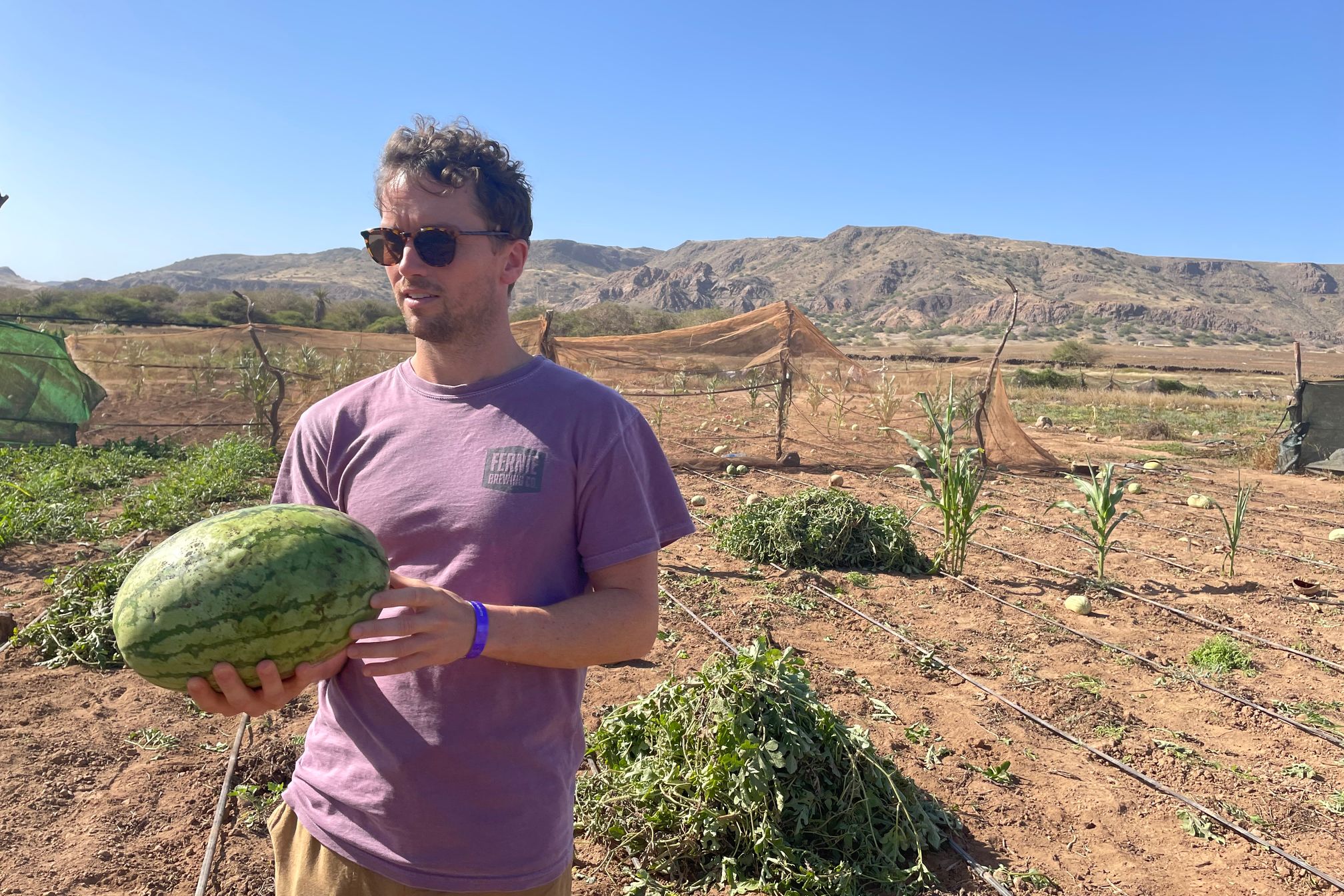 Paul holding a watermelon