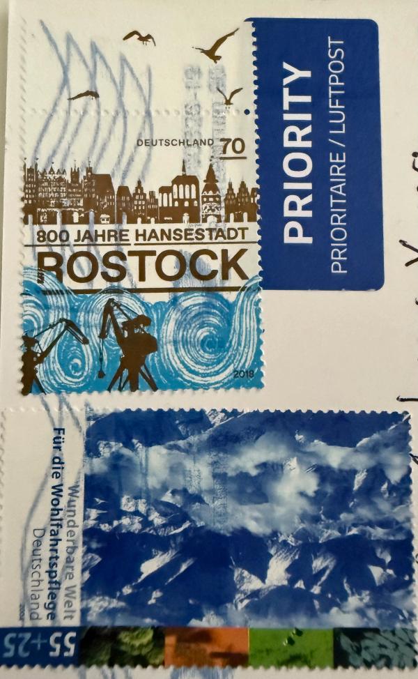 Postmark and stamps on the postcard from Dresden, Germany