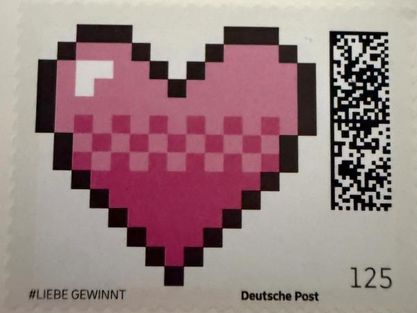 Postmark and stamps on the postcard from Bamberg, Germany
