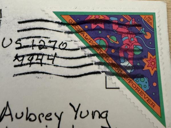 Postmark and stamps on the postcard from Punxsutawney, United States