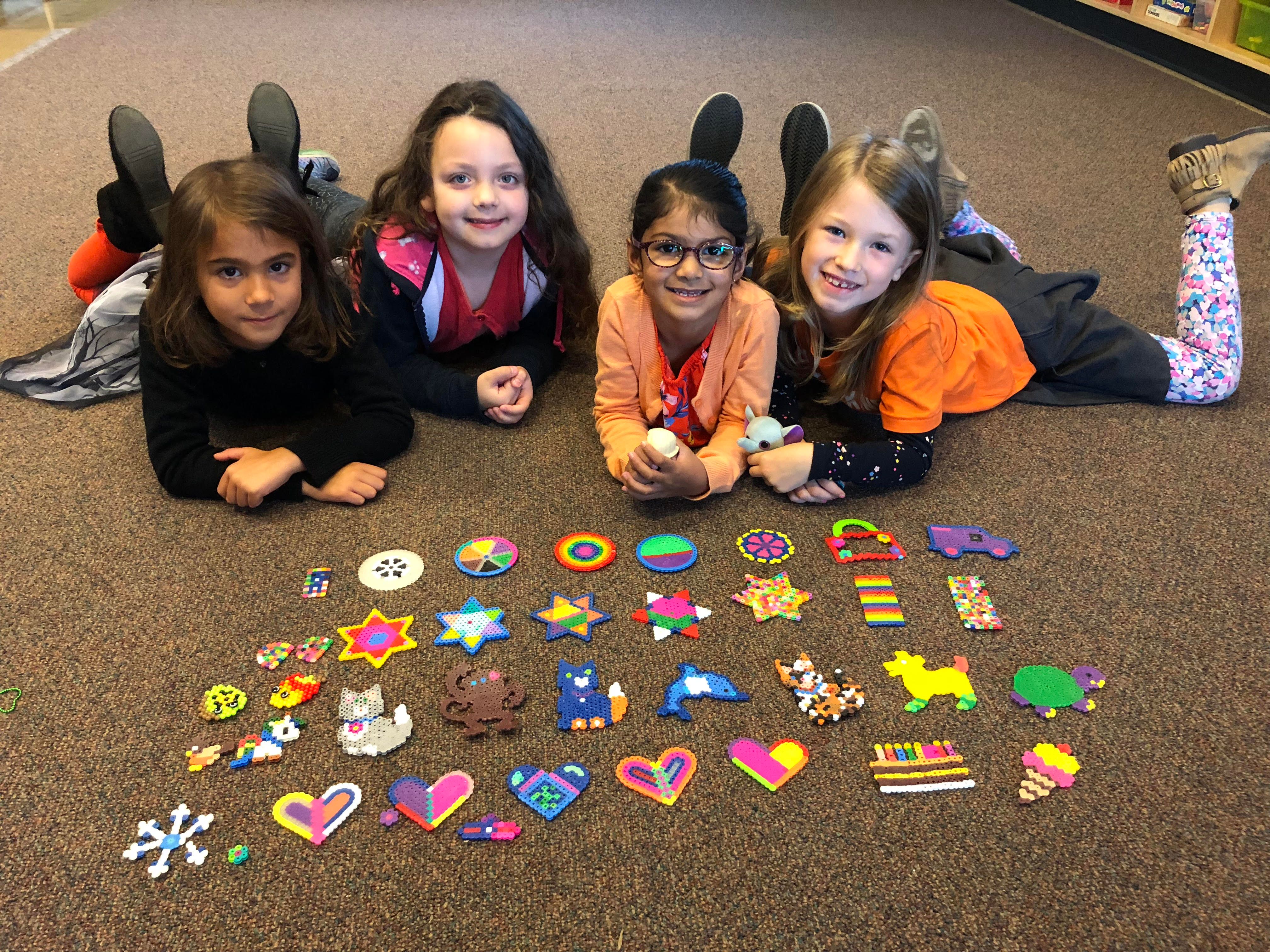 Children enjoying a creative program activity