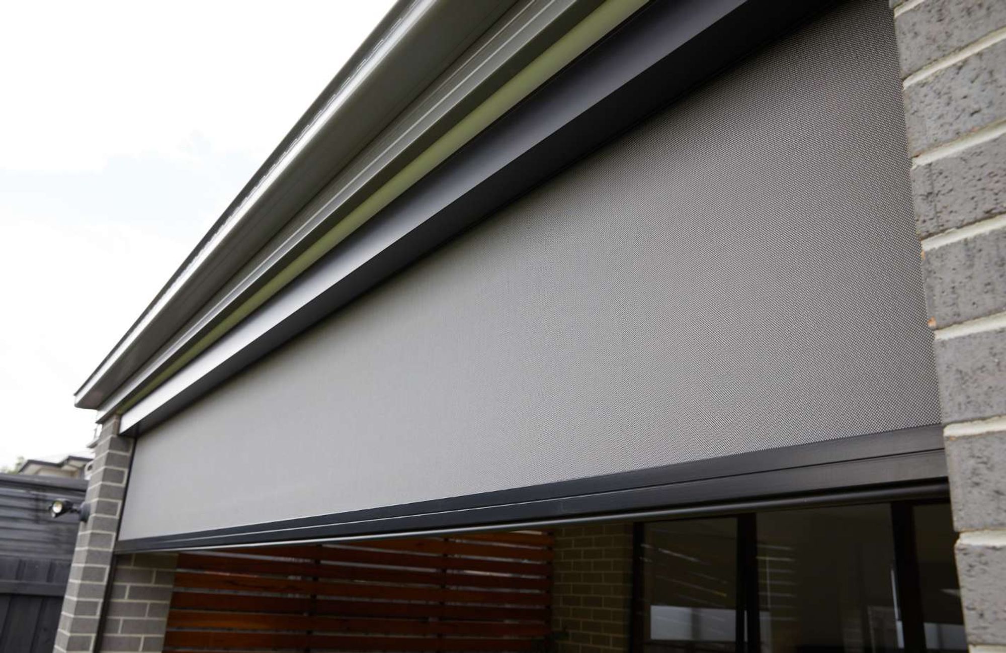 Motorised outdoor blinds on a modern home