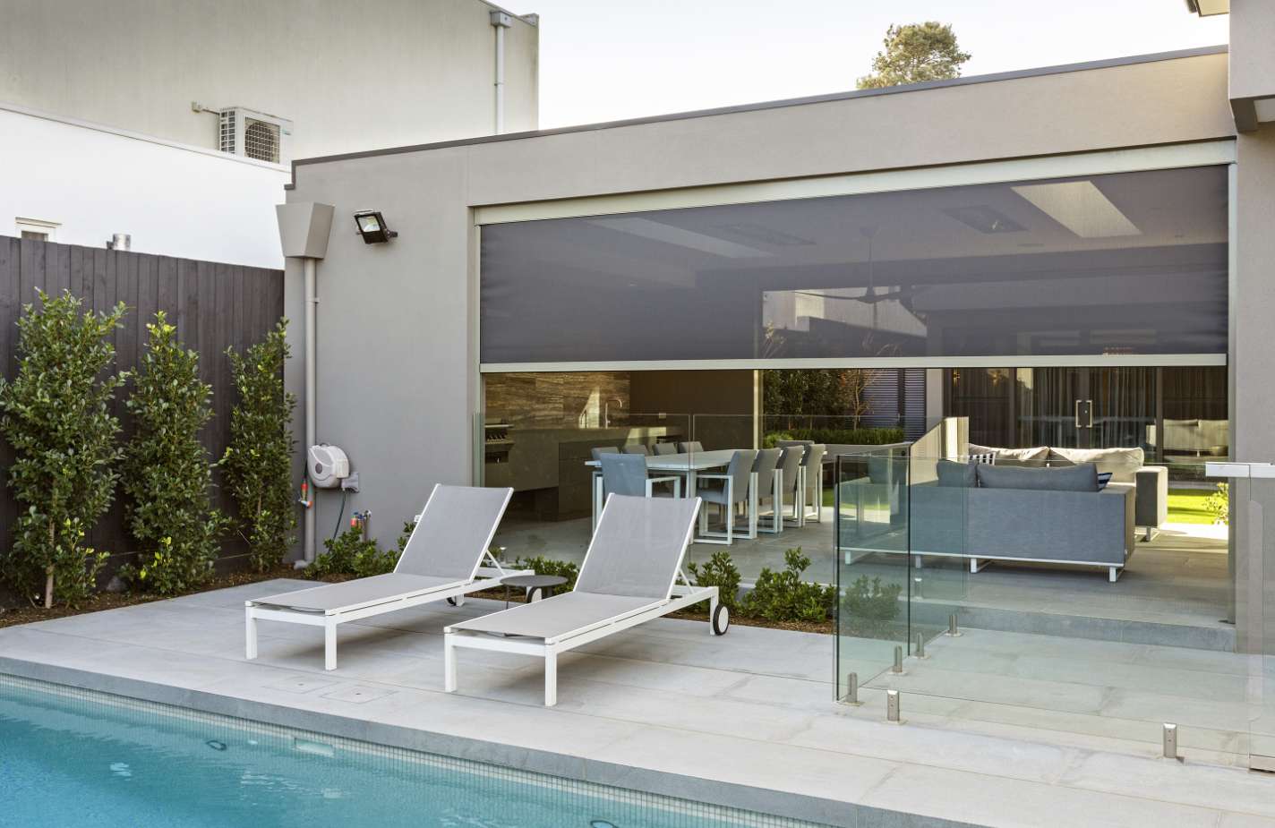 Poolside alfresco with an outdoor zip screen