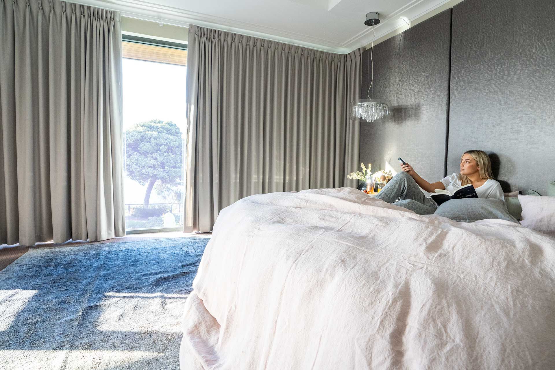 Motorised curtains controlled from a bedside remote
