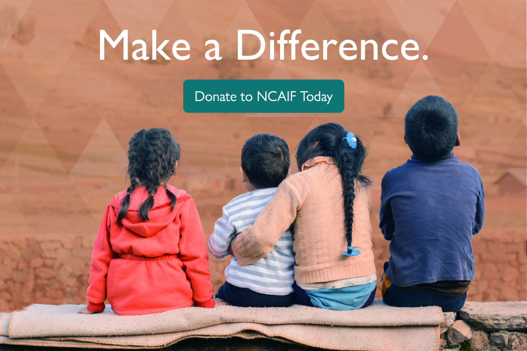 Four children sitting on a stone wall and blanket looking into the distance. Text reads, "Make a Difference. Donate to NCAIF Today." Selecting the image will take you to the donations page for NCAIF.