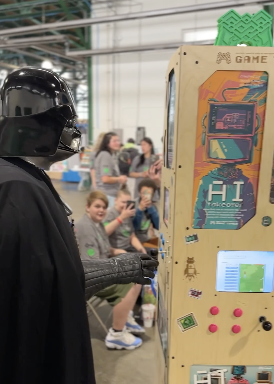 Game Tower at Syracuse Maker Faire with crowds of visitors playing, even Darth Vader!