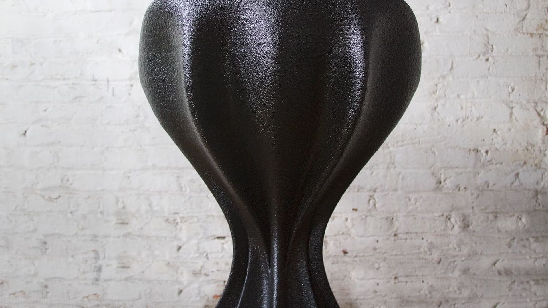 Detail of the flowing forms on the back of the Resolute Chair