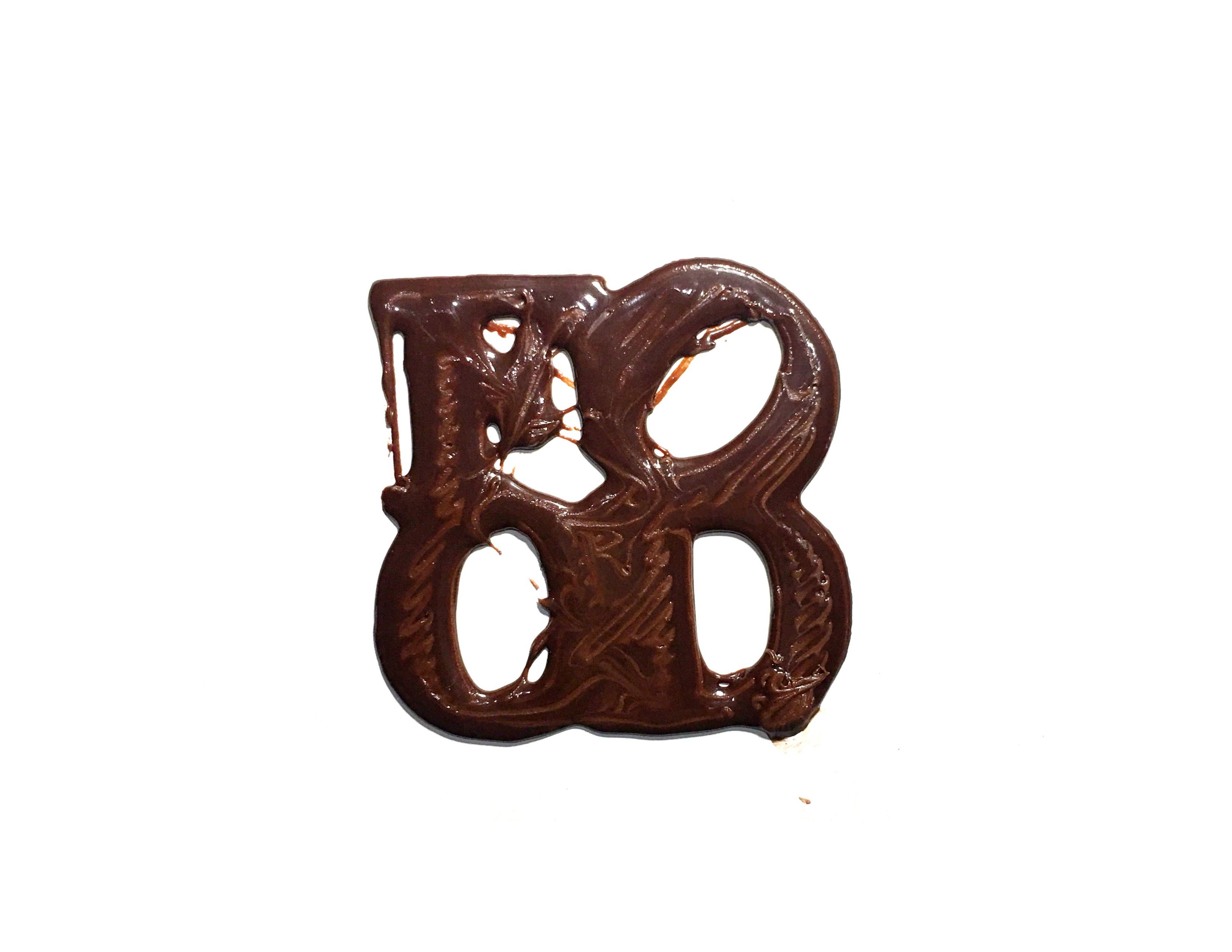 The first FOOD sculpture print—a mushy brown mess of chocolate frosting