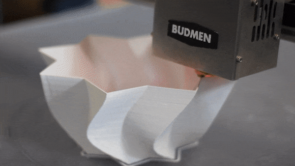 Video clip of Budmen® BUILDER 3D printer printing a swirled lamp shape