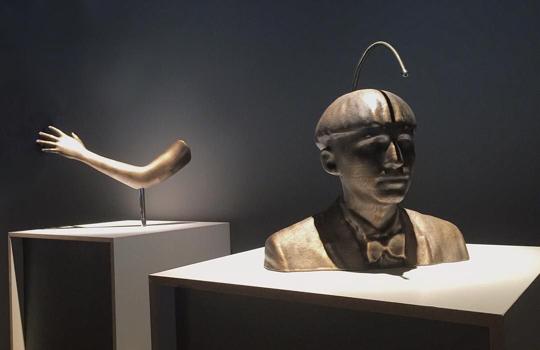 Visitors interacting with sculpture in Dublin, Ireland