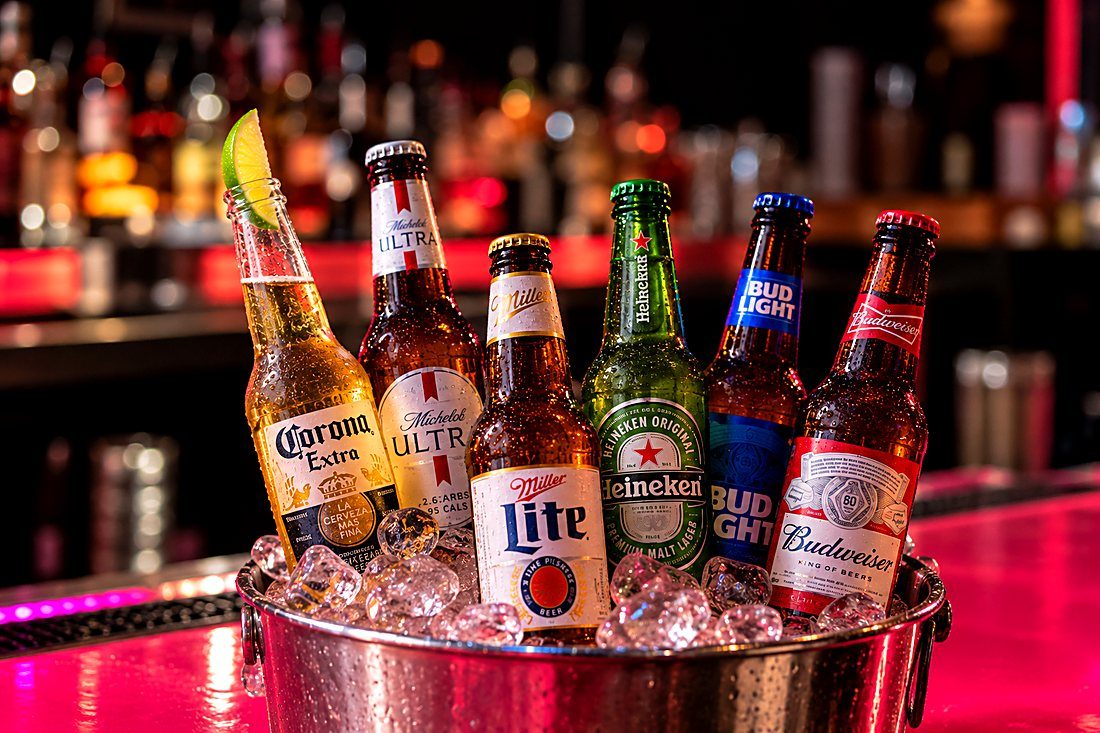 Bottles of Corona, Michelob Ultra, Miller Lite, Heineken, Bud Light and Budweiser on ice at the pink bar