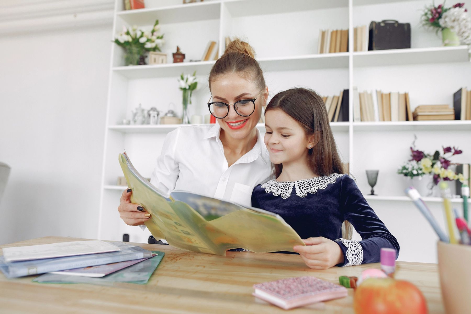 Parent reviewing a school performance report and academic ranking document in the UK