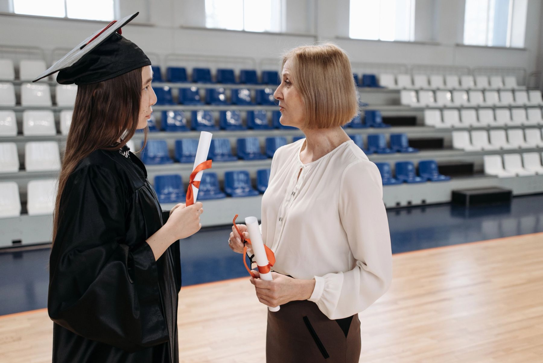 A parent offering encouragement and comfort to a student in a UK home setting