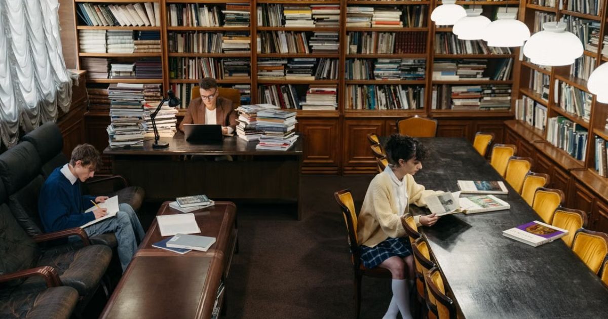 uk private school students library studying