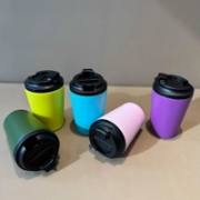 Insulated coffee tumblers showing the secure drinking lids