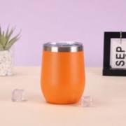 Orange 12oz egg-shaped insulated tumbler