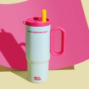 Blue and pink insulated tumbler with contrasting lid