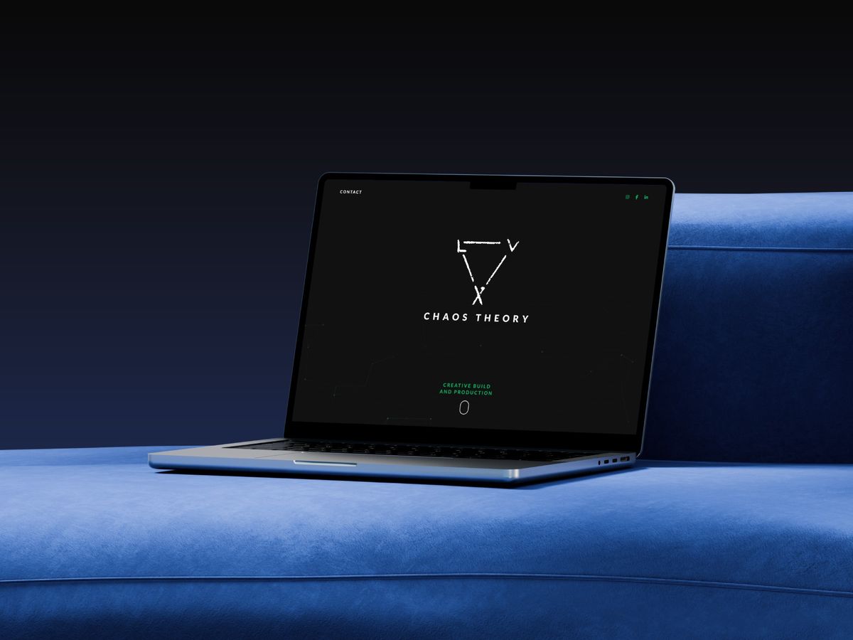 The Chaos Theory website on a laptop, dark with the studio’s minimal logo