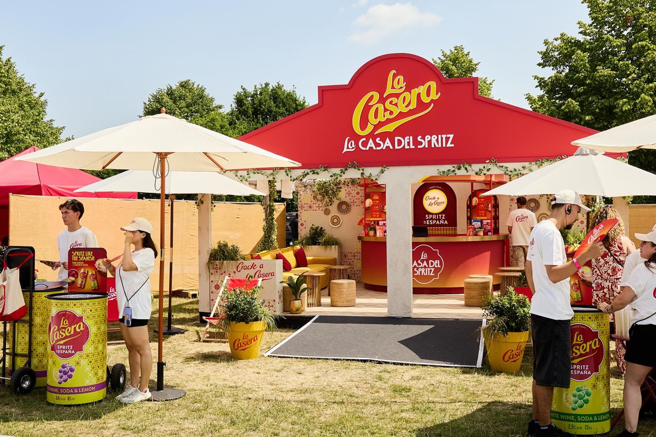 An outdoor festival bar activation for La Casera on a sunny day