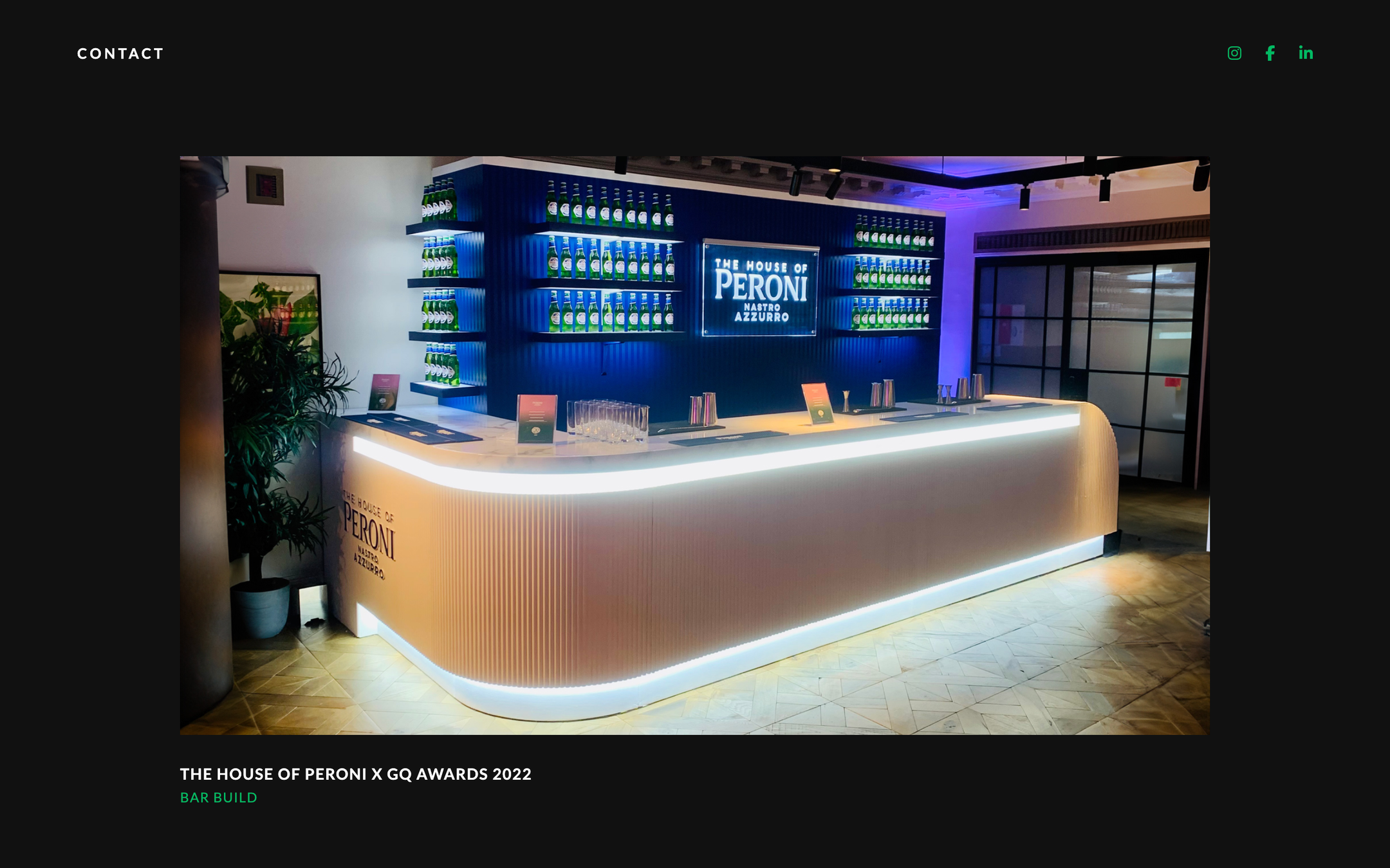 A blue-lit bar installation built for The House of Peroni at the GQ Awards