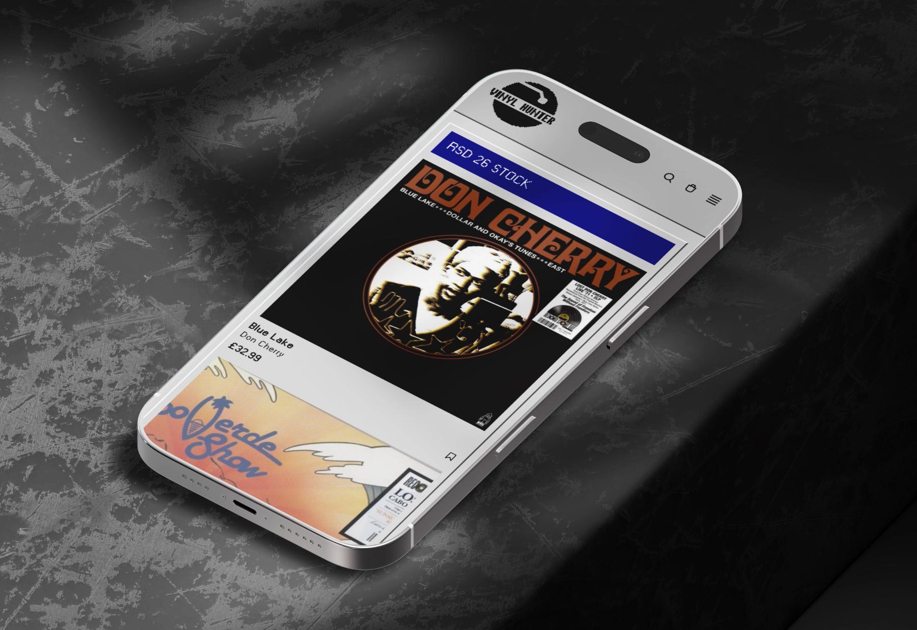 The Vinyl Hunter homepage, a Windows-inspired storefront with pixel type and bevelled panels