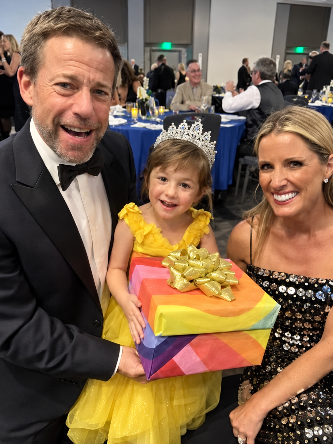 A Make-A-Wish reveal, a child receiving her wish alongside her family