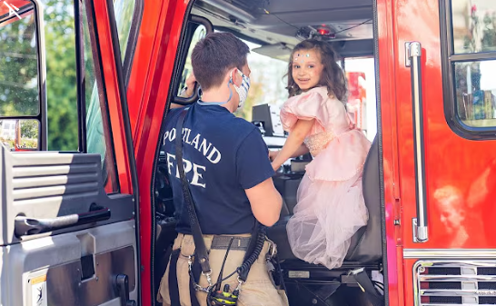 A Make-A-Wish child in a Portland Fire engine