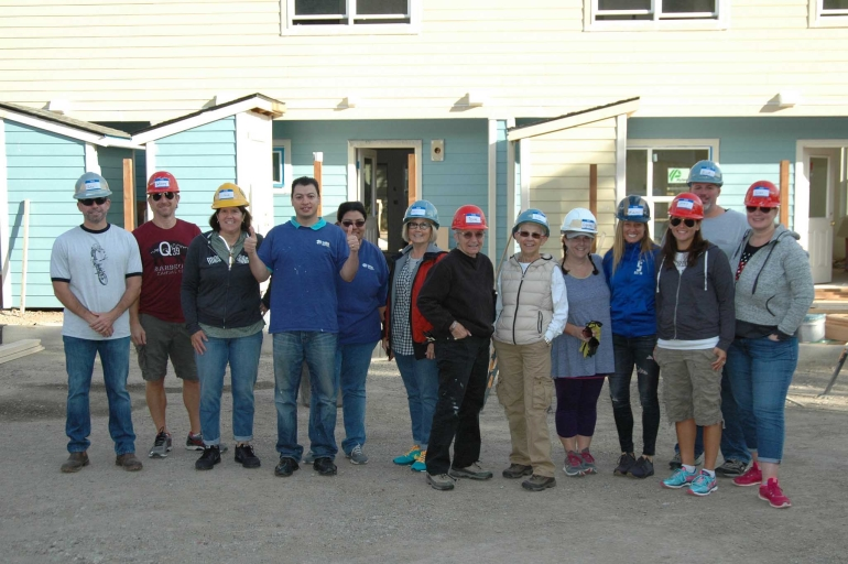 The Paulson Coletti team on a Habitat for Humanity build