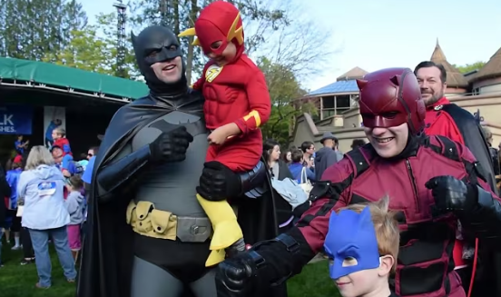 Volunteers in superhero costumes at Walk for Wishes