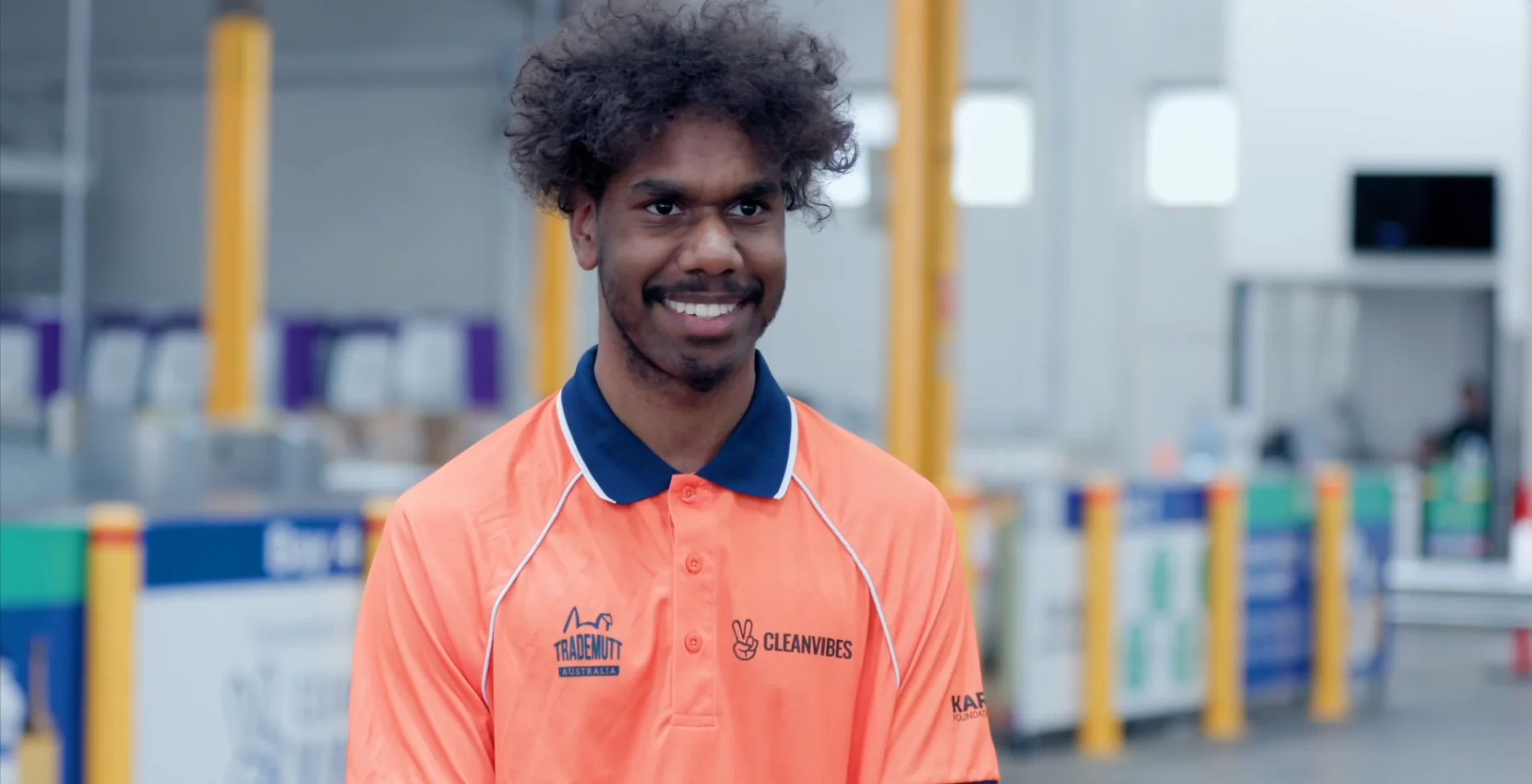 A young man in a depot