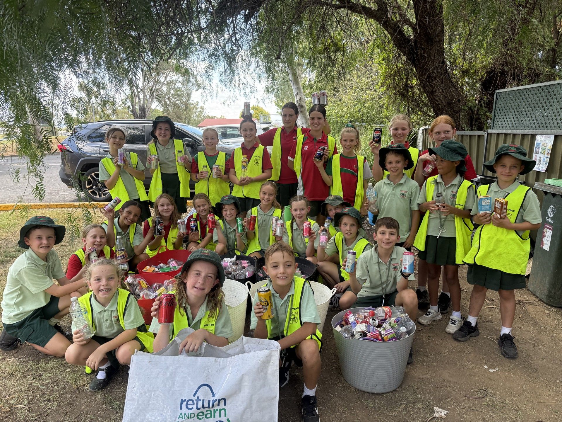 Cudgegong Valley students around their collected cans and containers