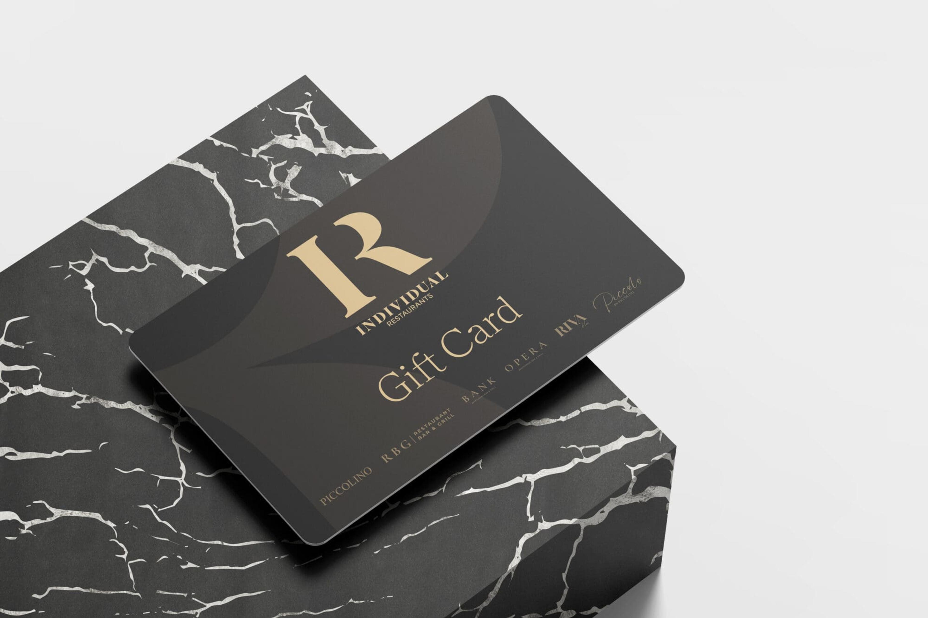 A Riva Blu gift card in a black presentation box with ribbon