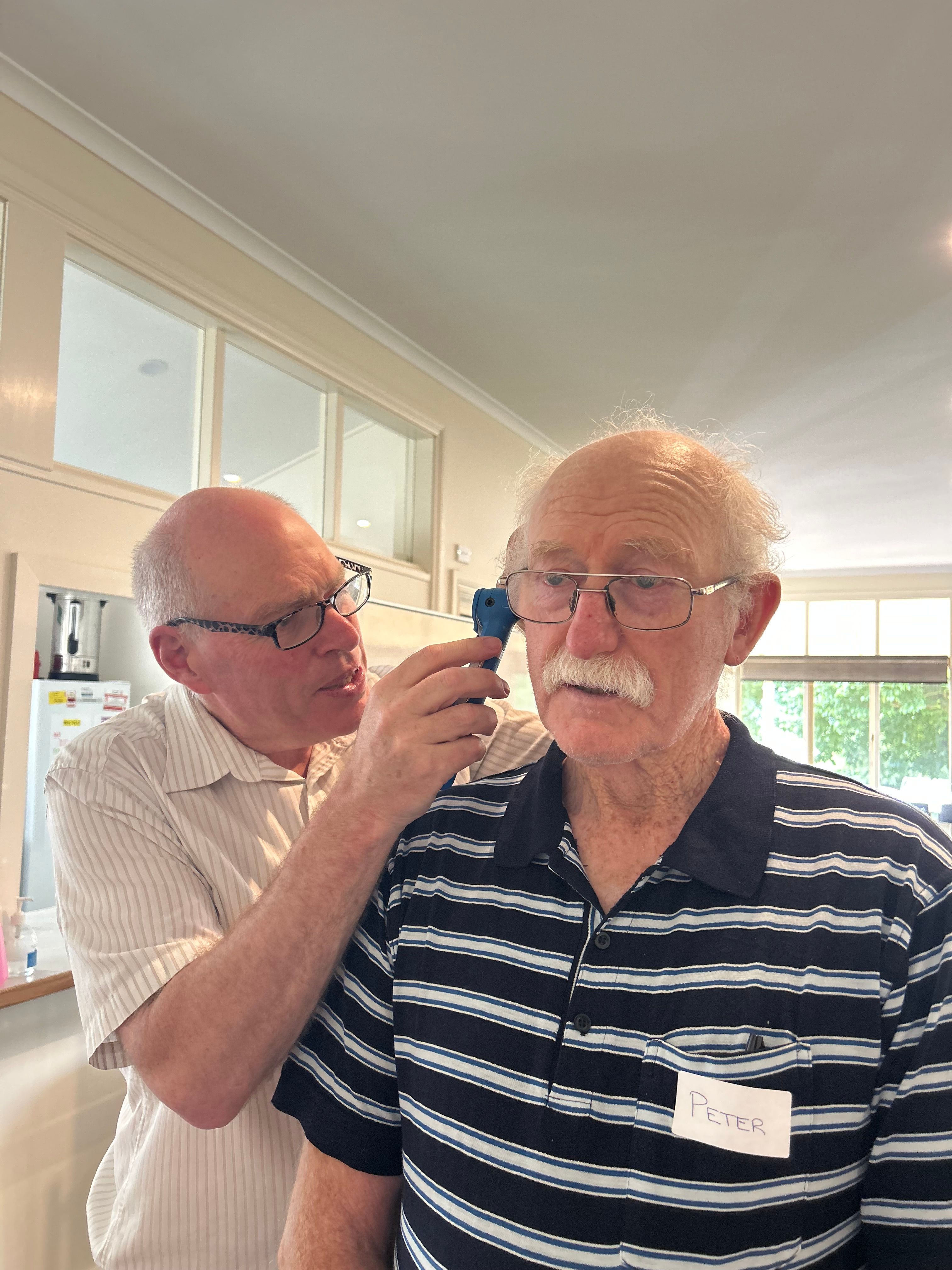 person getting an ear check 