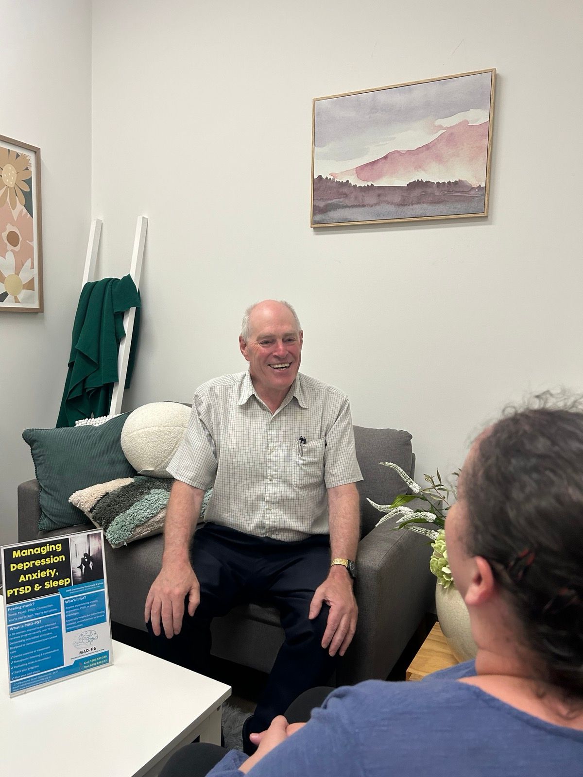 Two people in a clinic room 