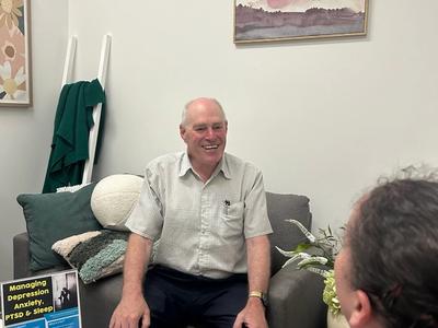 Two people in a clinic room