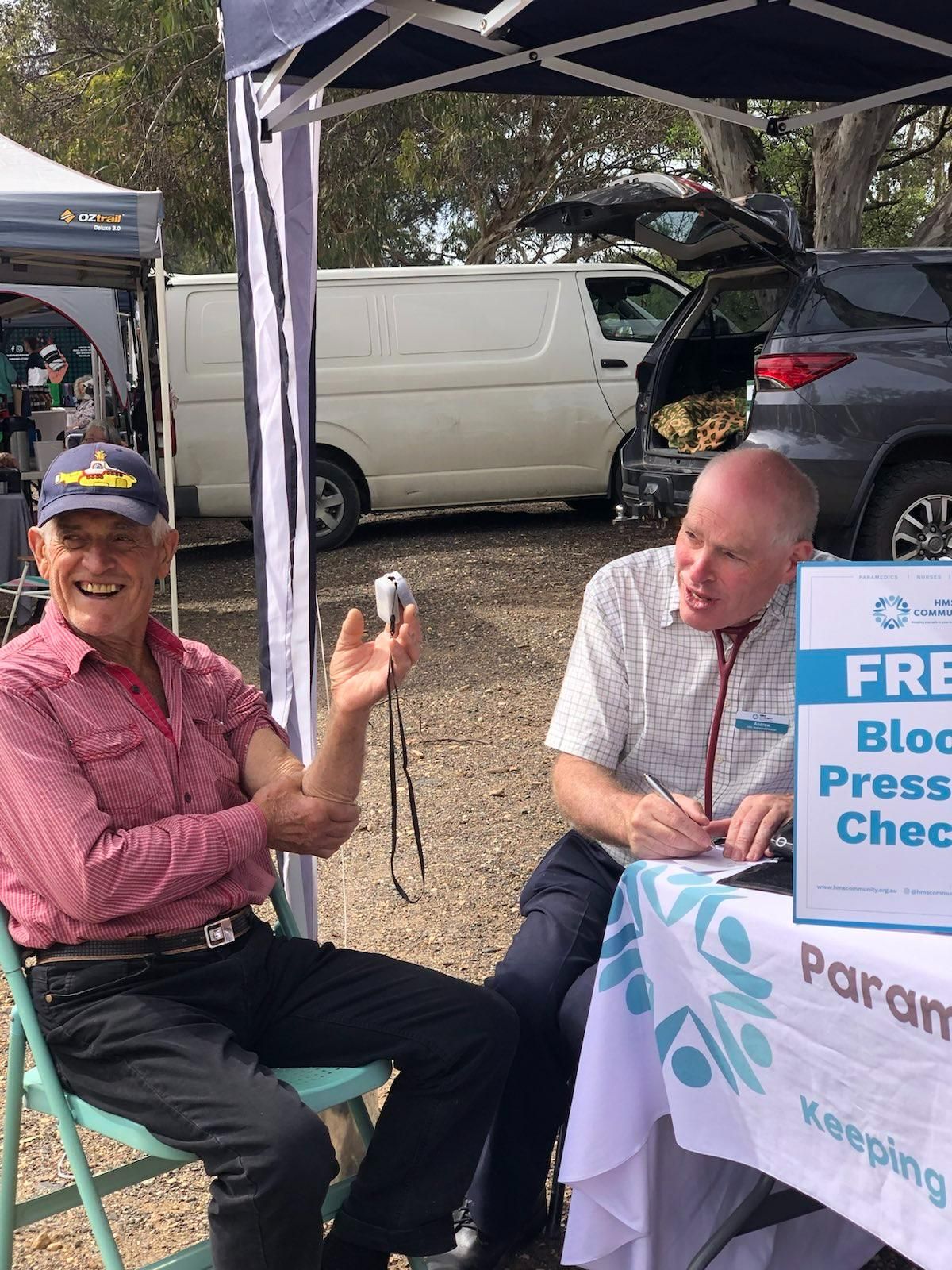 Person taking a blood pressure at the market