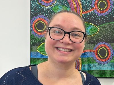 Tracey smiling in the clinic