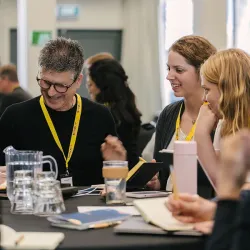 A cohort of agrifood innovators collaborating at a Sprout Accelerator event.