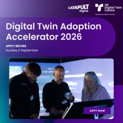 Engineers collaborating on a digital twin model on a large screen