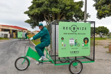 Diverse group of social innovators collaborating on a project.