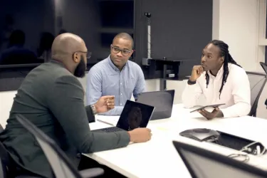African entrepreneurs collaborating in a workshop for the InvestoVilla program.
