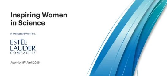 A diverse group of women scientists collaborating in a modern laboratory.