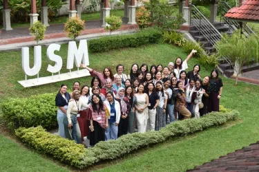 A diverse group of young women leaders from ASEAN countries collaborating at the Harpswell Summit.