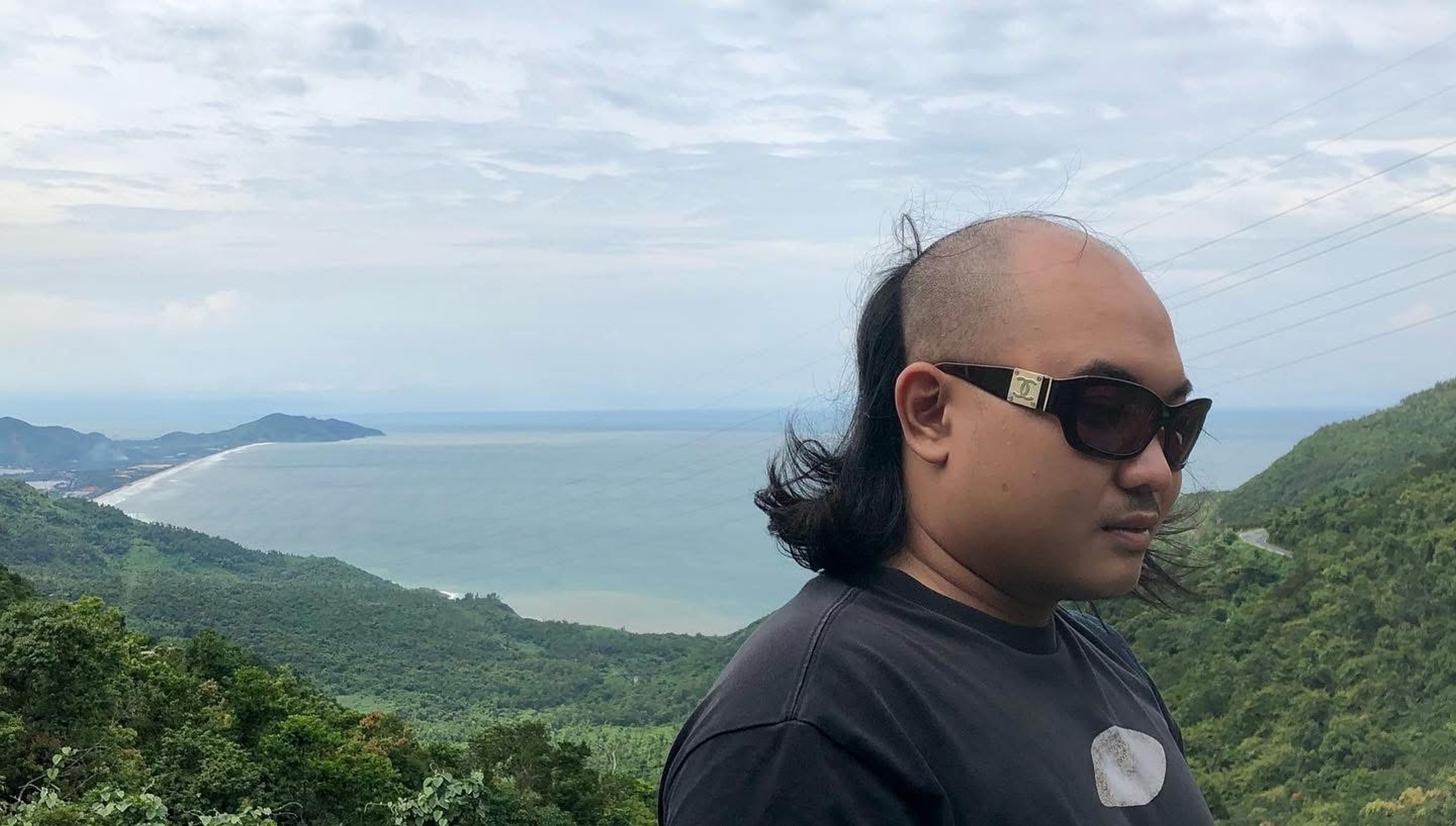 guy in the wind hair saigon hcmc