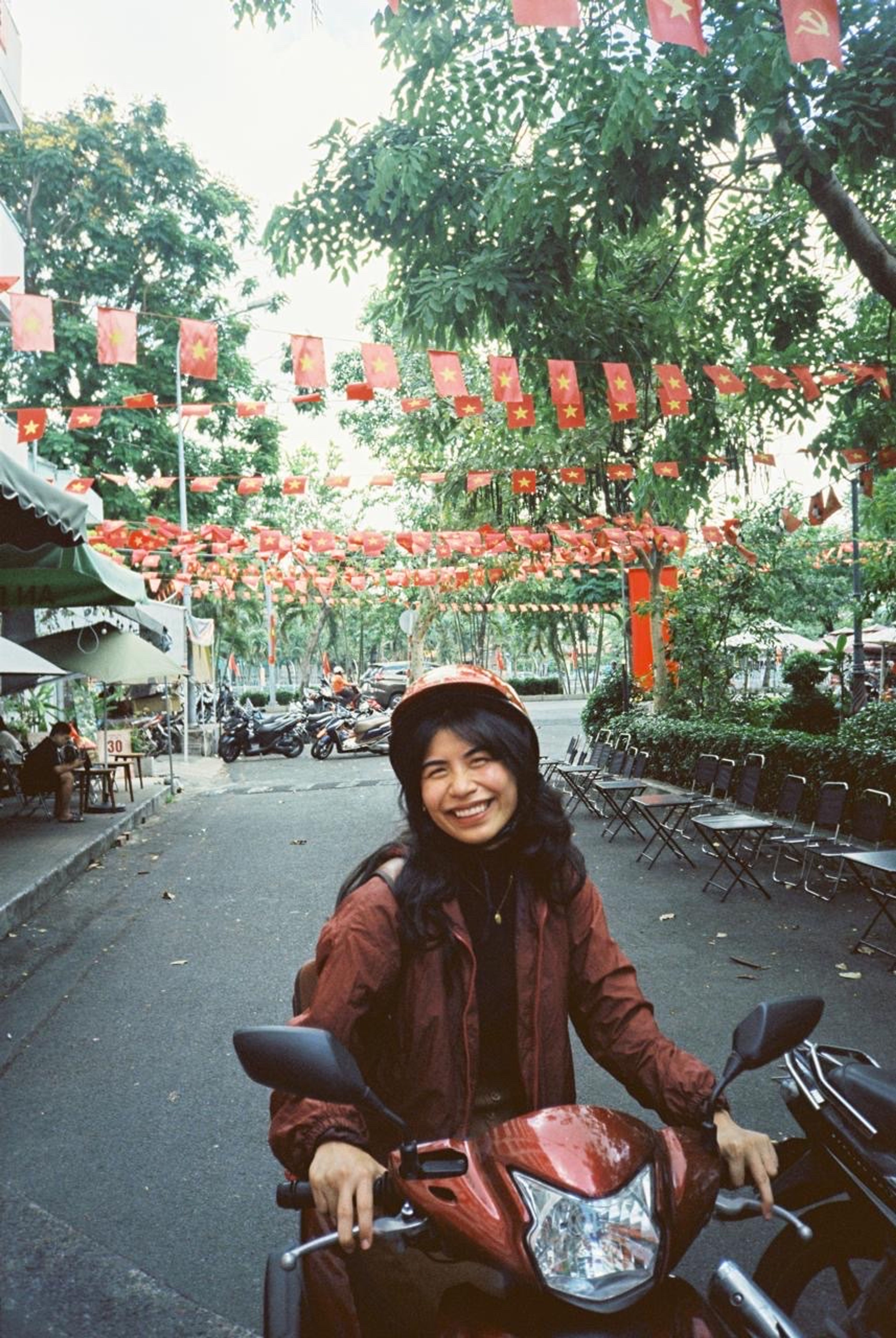 tammy on a motorbike in saigon
