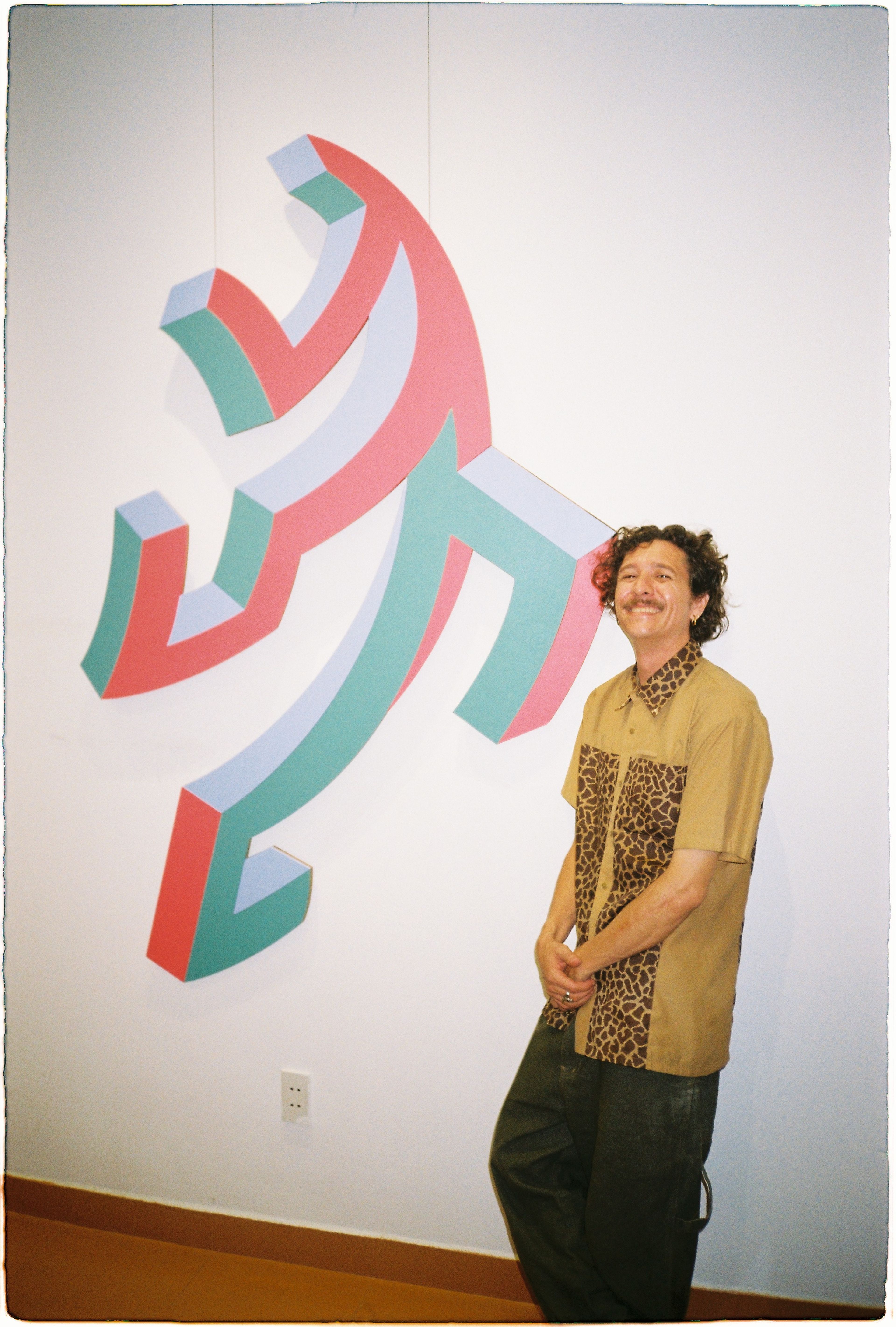 dano standing next to art 